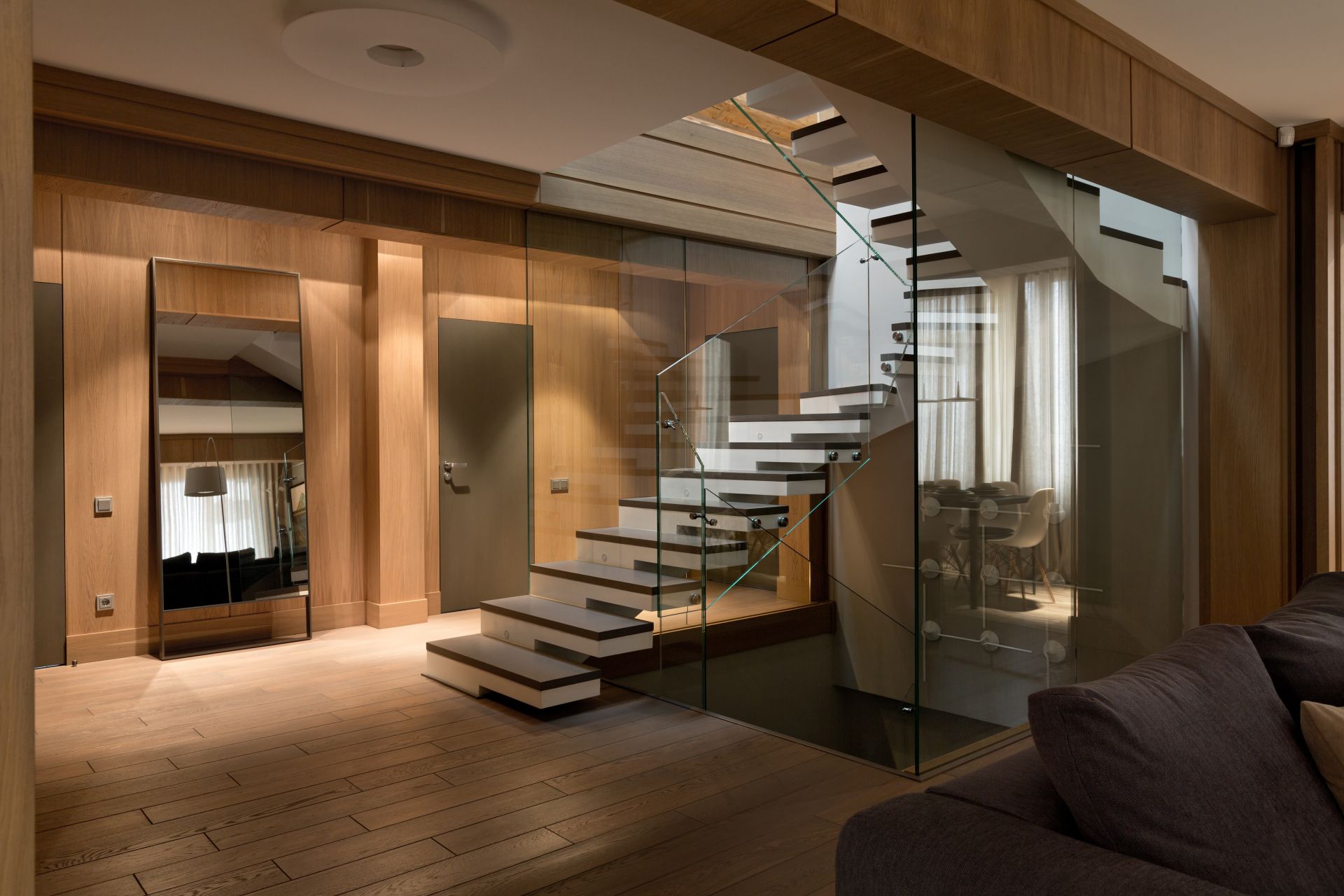 Staircase with glass railing
